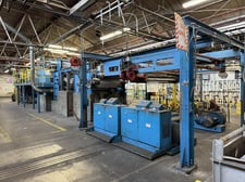 Jagenberg #SE-18, shaftless floor pick up unwind stand