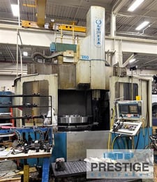 66" Olympia #V60, CNC vertical boring mill, 71" swing, 4-jaw chuck, 12 ATC, Fanuc 18i-T, 80 HP Siemens motor