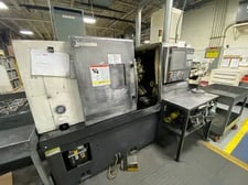 Okuma #Genos-L400, CNC lathe, 20.4" swing, 10" chuck, 3-jaw, 2.6" bar, 15.3" dia., 19.6" lgth, 22" centers