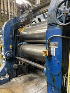 24" x 68" Adamson, 3 roll calender with a top inclined 120 degree roll