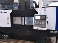 Hyundai Wia #F750B, CNC vertical machining center, Fanuc i Series, 61" X, 29.5" Y, 29.5" Z, 4500 RPM, 30 side