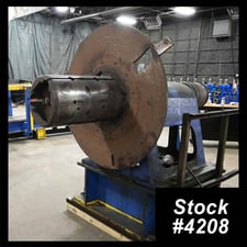 18000 lb. Equipment Inc., single uncoiler w/ feed ramp, 25" width, 62" outside dimensions, 15"-18" ID, 3-arm