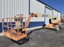 500 lb. JLG #E600JP, electric boom lift, 60' lift, electric engine, 2x4 traction, pneumatic tires, 2008