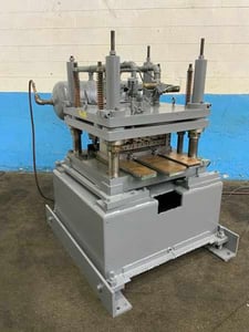 50 Ton, Airam #APT-128, pneumatic cut off, 3 stroke, 32-1/8" x 36-1/8" ram & bed, surge tank