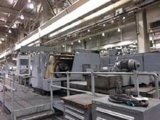 Butler Newall #ICG100, (2) 4-jaw 40" chks, 16" thru hole, 24' BF, GE Fanuc, hollow spindle, 2005, #17641