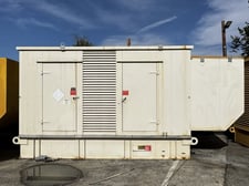 700 KW Caterpillar #3412C, 277/480 Volts, Weather Enclosed, Base Fuel Tank, 583 hours, 2000