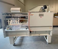 Texwrap, Spartan #2215L, compact automatic L-bar sealer with API VV218 shrink tunnel, up to 30 packages/min.