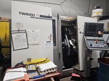 Gildemeister #Twin-32, CNC lathe, Twin turrets with 12 tools each, 2 spindles, 8000 RPM, Seimens 840D control