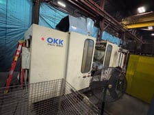 Okk #MCV-660, CNC vertical machining center, 25-1/2" x 67" capacity, 200/220 V., 24 automatic tool changer