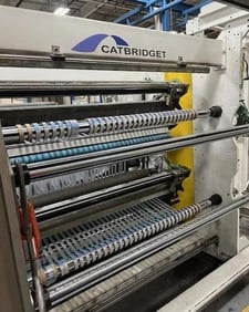 Catbridge #344-MC-18, 55" wide duplex turret slitter rewinder with core loading, shaftless floor pick-up, 2018