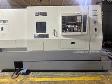 Hyundai Kia #SKT-300, CNC lathe, Fanuc 0iTC, 30" swing, 15" chuck, turbo chip conveyor, 2006