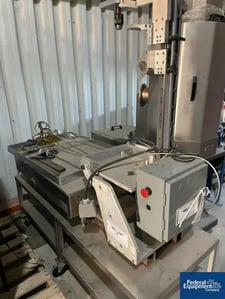 Patriot Tool, Inc. Bucket Tipper Unit, automated