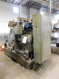 Acme-Gridley #RAN-6, 6 spindle, 1" spindle hole diameter, stock reel & stand, universal chip conveyor