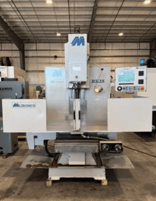 Milltronics #RH25, CNC Vertical Bed Mill, 50" X, 25" Y, 24" Z, 63" x20" table, 3-axis, 3000 lb capacity, 15