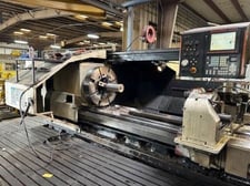 34" x 120" Mazak #Powermaster-Universal, Hollow Spindle Lathe, 14.7" spindle bore, 32" front & rear chucks