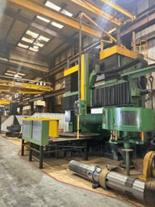 120" Homma, CNC Vertical Boring Mill, 120" table, 87" U/Rail, 75 HP, 120 RPM, 12 ATC, Fanuc 10T, chip