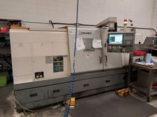 Okuma #Captain-L470M/1250, CNC turning center, 24.4" swing, 15" chuck, 4" bar, 16.53" dia., 49.21" lgth
