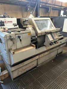 Harrison #Alpha-400, 2-Axis CNC Lathe, 16" swing, 49" machining length, 12" chuck, 2.1" bar, 10 HP, 2500 RPM