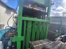 Vertical tire baler, 15 HP, 220 V., 3 phase, 22 GPM pump, 1.5/2 bales/per hour, 70-75 tires per bale
