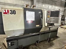 Haas #ST-30, 2-Axis CNC Lathe, 31.7" swing, 21" turning diameter, 26" machining length, 10" chuck, 3" bar, 30
