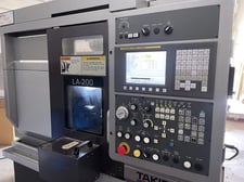 Takisawa #LA-200, CNC lathe, 18.5" swing, 8" chuck, 3-jaw, 2" bore, 12.6"dia., 11.8"lgth, 15 HP, 3200 RPM
