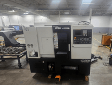 Hyundai WIA #SE2000PA, CNC Lathe, 13.8" max. turning diameter, 11" max. turning length, 6" chuck, 20 HP, 6000