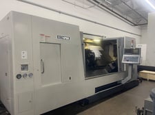 Mighty #VT40B+M/2000, CNC lathe, 39.3" swing, 24" chuck, 3-jaw, 7.4" bar, 34.6" dia., 12 turret, C-Axis