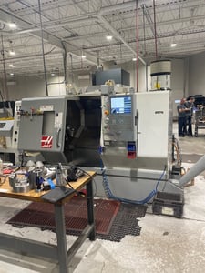Haas #SL-30T, CNC lathe, 30" swing, 3" bar, 17" turn.diameter, 32" machining length, Servo Bar 300 bar