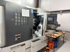Mori Seiki #NL-2500SY, CNC lathe, 36.4" swing, 10" chuck, 3" bar, 25 HP, 4000 RPM, chip conveyor, 2006