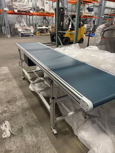 24" wide x 10' long, AMC conveyor, extruded & anodized aluminum frame, indexing functionality w/vari-speed