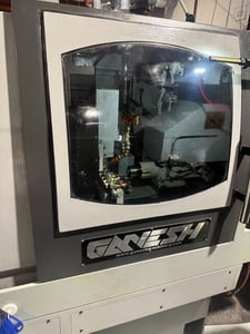 Ganesh #Cyclone-32CS, Swiss Type Automatic Screw Machine, 27 tool, 10 HP, 1.42" bore, 6000 RPM, chip