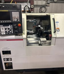 Miyano #BNA-42S, CNC turning center, w/ M-542 magazine bar loader, conveyors, live tooling, 2013