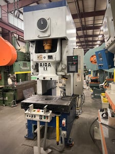 121 Ton, Aida #NC1-11(2)-B, back gear obi press, 7.1" stroke, 26.2" between housing, 35-70 SPM, 3.5" adj, 1983