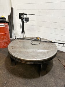 5000 lb. Norwalk #CR5052, pallet decoiler, 60" outside dimension, 12"-40" stack height, loop Control arm w/