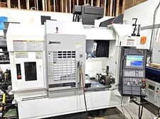 Okuma #Genos-M560-V, vertical machining center, 41.3" X, 22.1" Y, 18.1" Z, 30 HP, 32 automatic tool changer