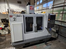 Haas #VF-2D, 4 Axis CNC vertical machining center, 30,000 RPM, 20 automatic tool changer, 20 HP, probe, 671