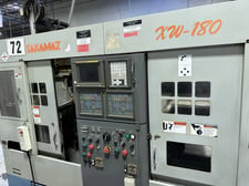 Takamaz #XW-180, multi spindle CNC lathe, 2" bar, 8" dia., 7.5 HP, 3500 RPM, Fanuc 21T, chip conveyor, 2006
