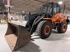 Doosan #DL220-5, wheel loader, 3 cu.yd. bucket, 6-cylinder, 160 HP, 4" bore, 5" stroke, 24.3 MPH, foam filled