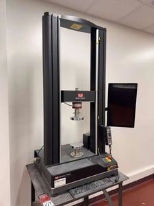 Instron #68TM-50, dual column unviersal testing machine, 50 kN force capacity, crosshead travel: 44.01" (E1)
