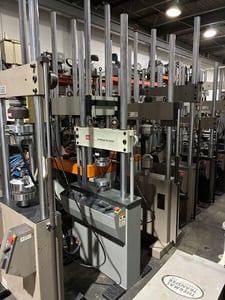 22 KIP (100kN), MTS #810 model 318.10, fatigue frame, 54" test opening, 2 columns, 20.75" x 8.25" table,