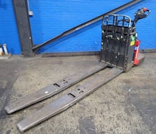 8000 lb. The Raymond Corporation #8410, Riding Electric Pallet Jack, 10" x 95" Fork length, 24 V, Battery