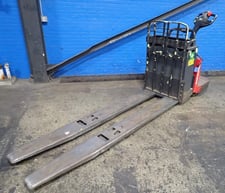 8000 lb. The Raymond Corporation #8410, Riding Electric Pallet Jack, 10" x 95" Fork length, 24 V, Battery