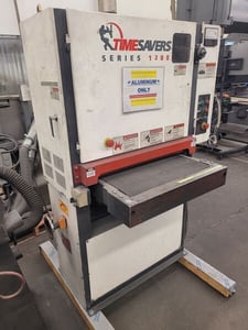 25" x 60" Timesavers #1211-12-0, single head belt sander, 15-40 FPM, 10 HP, 2006