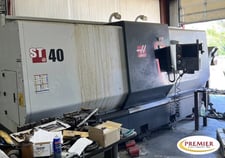 Haas #ST-40, CNC lathe, 34.5" swing, 4" bar, 15" chuck, Jorgensen belt type chip conveyor, 2014