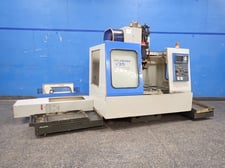 Kia #V35, CNC vertical machining center, 18" x 36" capacity, Fanuc O-M Control, chip pan, w/ parts, 1996