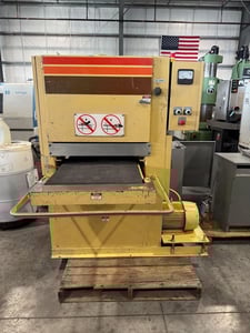 25" x 60" Strippitt Timesavers #25-HD, metal belt sander, 15-40 FPM, electronic tracking, pneumatic belt