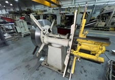 4000 lb. Perfecto #40-16, double end uncoiler, 18" mandrel width, 60" outside dimensions, 16"-20" ID, manaul