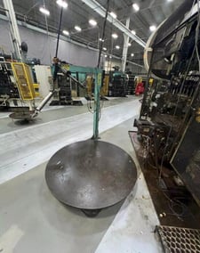 6000 lb. Coilmate #CM6048, pallet decoiler, 60" table diameter, 27 RPM, 37" stack height, dancer arm, 1994