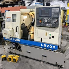 Okuma #LB-200C, turning center w/ bar feed, OSP-U100L Control, 2001