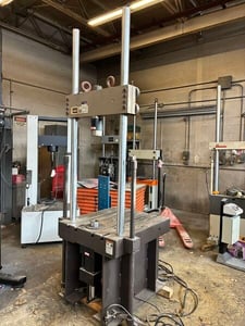 55 KIP (250kN), MTS #322.21, T-slotted bed plate nfatigue load frame, 2 columns, 24" btwn columns